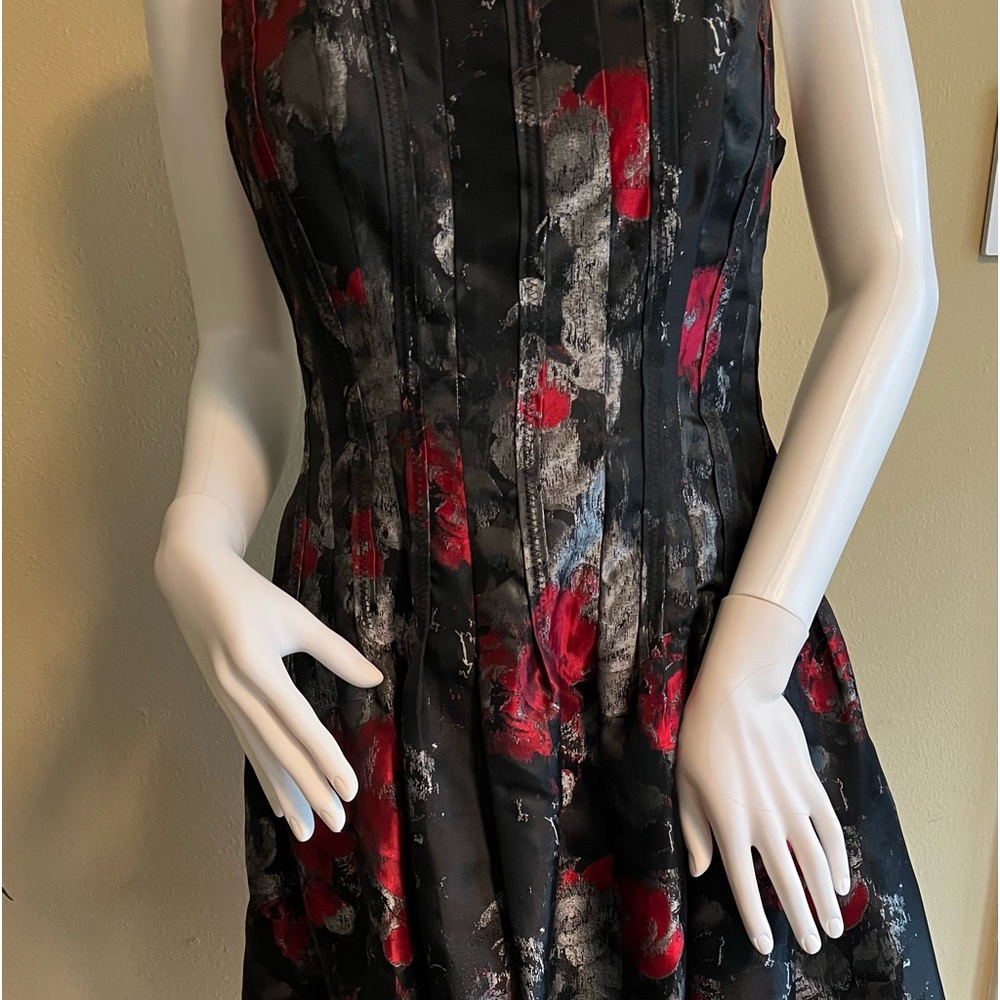 Beautiful cocktail length dress. Worn 1x - lots of compliments!